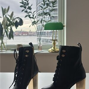 New/ never worn Michael Kors Black Boots with Gold Heels